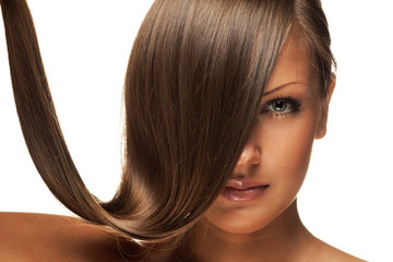 Obraz premium closeup portrait of a young woman with beautiful long hair