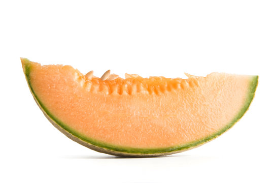 cantaloupe melon slice isolated on white background