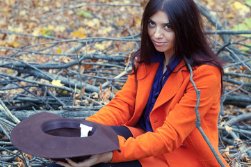 beautiful girl in the orange suit begging