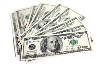 A close up of hundreds of dollars.