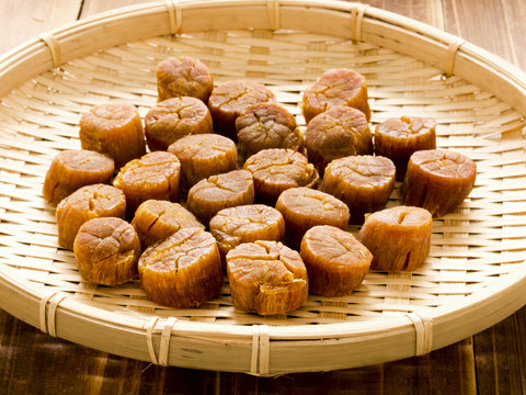 close up of a basket of dried scallops