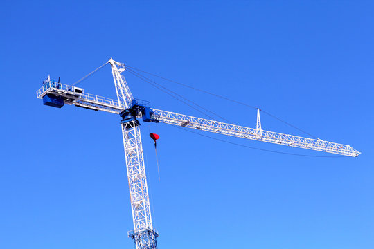 Image of isolated crane at the construction side
