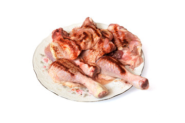 Raw chicken meat on the plate