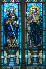 A colorful of St.Paul and St.Peter stained glass church window.
