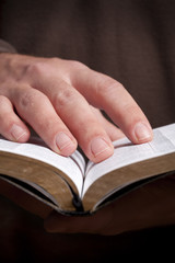 Man Holding Bible