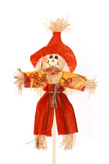 Cute autumn scarecrow isolated on white