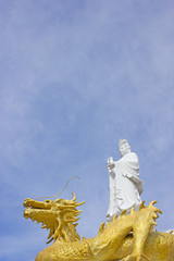 Fototapeta premium Guan yin on the golden dragon