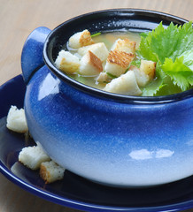 Vegetable soup with crouton and parsley