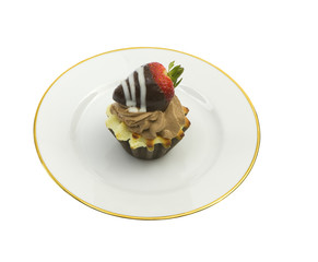 delicious chocolate cream tart with strawberry on top, isolated