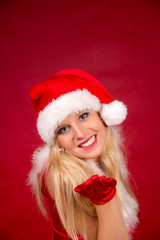 Beautiful blond girl in santa costume
