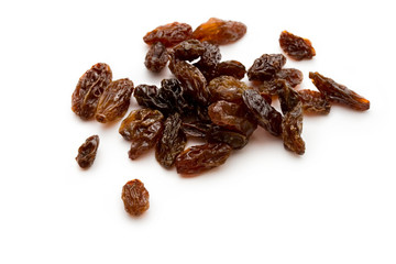 Raisins on the white background