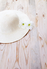 beach hat with white flower