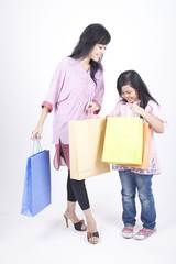 Mother and daughter shopping together