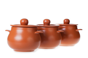 Clay pots for cooking isolated on white background