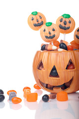 Halloween candy in pumpkin bowl