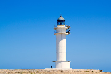 Formentera Barbria Lighthouse in blue sky