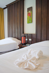 Hotel room with bed and wooden