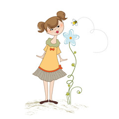 romantic young girl smelling a flower