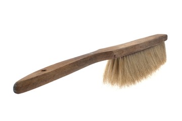 Old pig hair hand broom isolated on white
