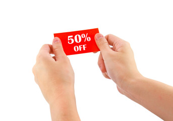 hands holding red card with 50 percent off isolated on white