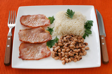 Fried pork with rice and beans