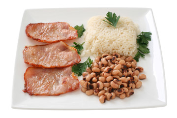 Fried pork with rice and beans