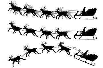 Silhouettes of Santa and his sleigh and reindeer