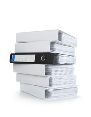 A pile of ring binders