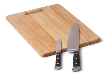 table knife and wooden cutting board