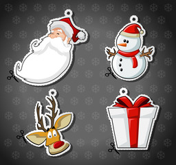 Labels of Santa Claus, reindeer, snowman, and christmas gift