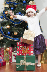 Merry Christmas - little girl with Christmas gifts