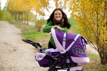 Fototapeta na wymiar close-up happy mama z wózkiem