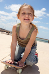 little girl on her skateboard © atikinka2