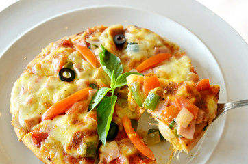 homemade pizza ,pizza on fork