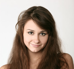 Fototapeta premium portrait of beautiful young girl smiling