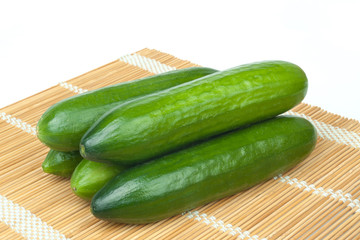 Cucumbers on a straw mat