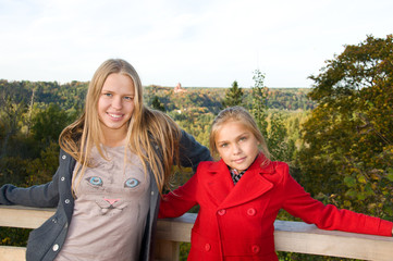 Two beautiful girls in the forest