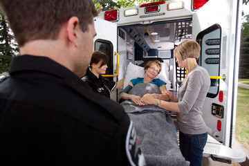Senior Woman with Paramedics © Tyler Olson