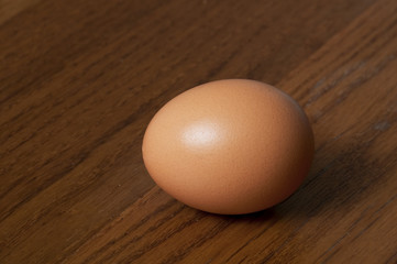 Egg on wooden table
