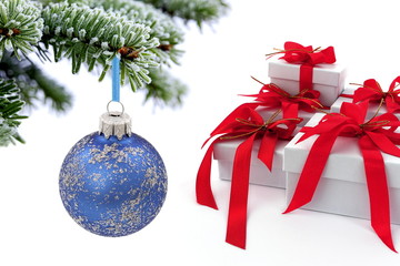 Christmas tree over  gift with red ribbon