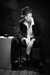 Woman smoking  cigarette in bar