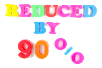 reduced by 90% written in fridge magnets