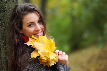 Girl in park colourful autumn