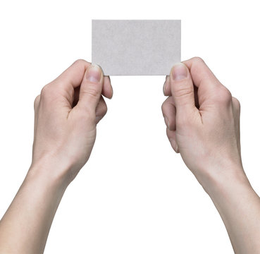 hands holding a business card