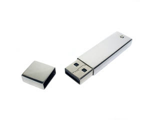 Flash drive. USB flash drive with a silvery metal case.