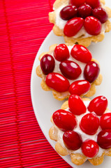 Pastries with berries in the plate
