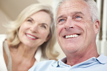 Happy Senior Man & Woman Couple Smiling at Home