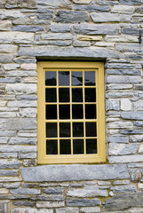 Beautiful window in stone building