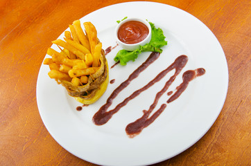 French fries served with ketchup