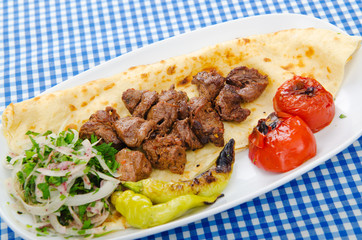 Kebab served in the plate